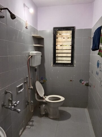 Bathroom in 3 BHK Apartment at Kopar Khairane – for Rent