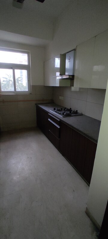 Kitchen in 4 BHK Apartment at Puri Aanandvilas, Sector 81 – for Rent