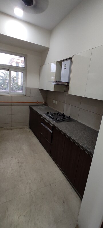Kitchen in 4 BHK Apartment at Puri Aanandvilas, Sector 81 – for Rent