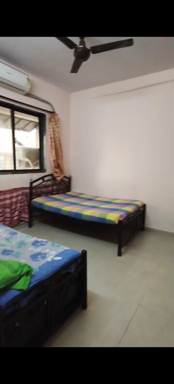 Bedroom in 2 BHK Apartment at Crystal Tower, Parel – for Rent
