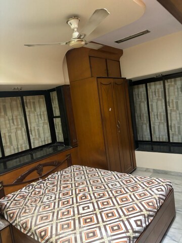 Bedroom in 2 BHK Apartment at Gulmohar Heights Vile Parle West, Vile Parle West – for Rent