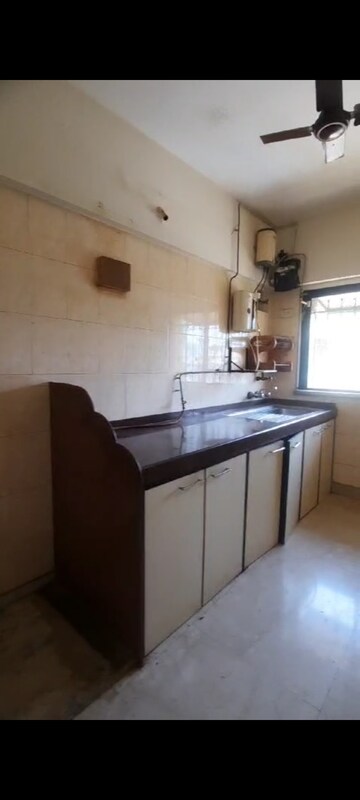 Kitchen in 3 BHK Apartment at Shiv Parvati Apartments Andheri, Andheri West – for Rent