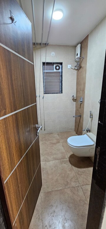 Bathroom in 1 BHK Apartment at Shree Parleshwar CHS, Vile Parle East – for Rent