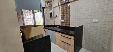 Kitchen in 1 BHK Apartment at Shree Parleshwar CHS, Vile Parle East – for Rent