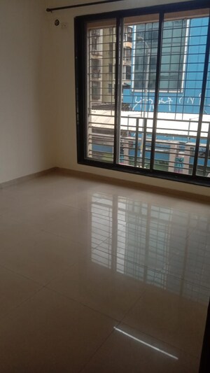 Room in 2 BHK Apartment at Nandwara Elite Enclave, Kopar Khairane – for Sale