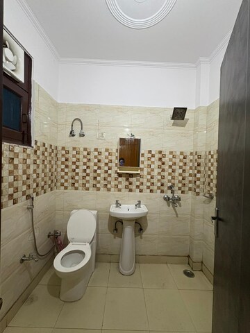Bathroom in 3 BHK Builder Floor at Gyan Khand ii – for Sale