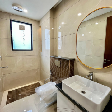 Bathroom in 4 BHK Builder Floor at Ansal API Esencia, Sector 67 – for Sale