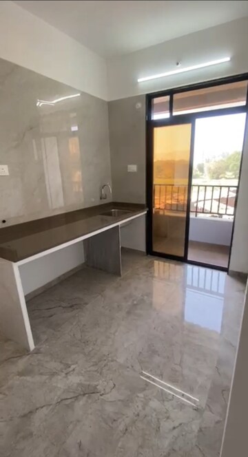 Kitchen in 1 BHK Apartment at Rudis Shivalaya Heights, Khidkali – for Sale