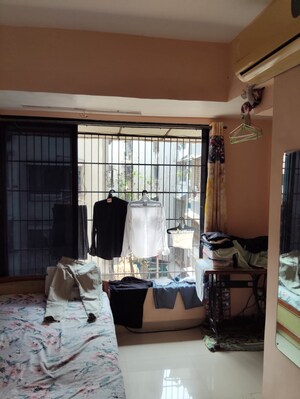 Master Bedroom in 1 BHK Apartment at Shamik Shiv Kripa, Dombivli East – for Sale