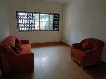 Living Room in 2 BHK Apartment at Pooja Apartments Khar, Khar West – for Rent