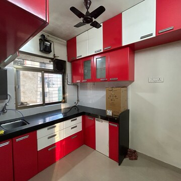 Kitchen in 2 BHK Apartment at Cosmos Jewels Solitaire, Pratha Pushp Society – for Rent