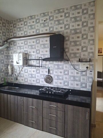 Kitchen in 2 BHK Apartment at Ajmera Housing Society, Pimpri – for Rent