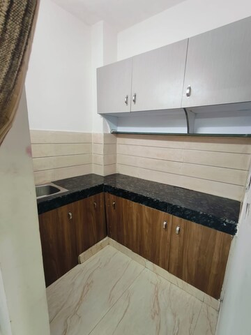 Kitchen in 2 BHK Apartment at Amrapali Silicon City, Sector 76 – for Sale