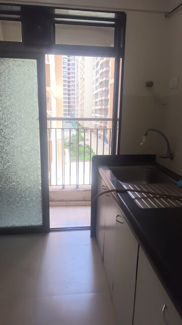 Kitchen in 2 BHK Apartment at Supertech Cape Town, Sector 74 – for Sale