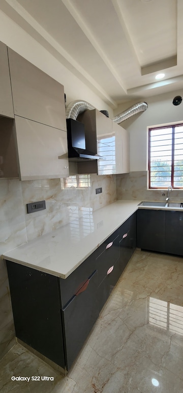 Kitchen in 2.5 BHK Apartment at Puri Pratham, Sector 84 – for Sale