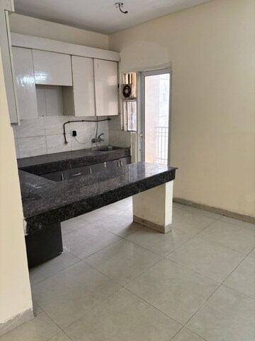 Kitchen in 1 RK Apartment at Gaur City 2 - 14th Avenue, Sector 16c Greater Noida – for Rent