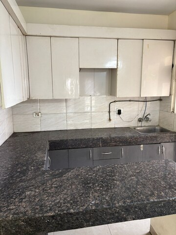 Kitchen in 1 RK Apartment at Gaur City 2 - 14th Avenue, Sector 16c Greater Noida – for Rent