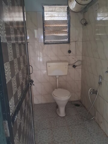 Bathroom in 2 BHK Apartment at New Krishna Tower, Kopar Khairane – for Rent