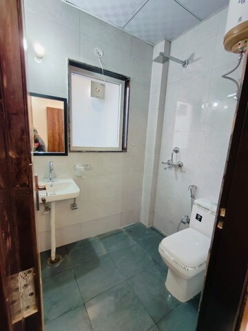 Bathroom in 3 BHK Apartment at Amrapali Zodiac, Sector 120 – for Sale