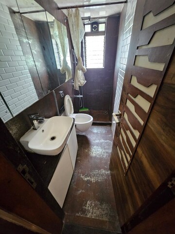 Bathroom in 2 BHK Apartment at Sagar Sanjog CHS, Andheri West – for Rent