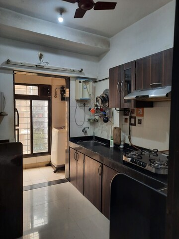 Kitchen in 2 BHK Apartment at Sagar Sanjog CHS, Andheri West – for Rent