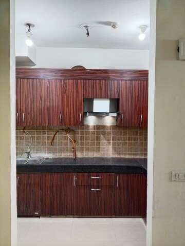 Kitchen in 1.5 BHK Apartment at Mahagun Mywoods, Sector 16c Greater Noida – for Rent