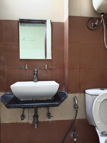 Bathroom in 1.5 BHK Apartment at Mahagun Mywoods, Sector 16c Greater Noida – for Rent