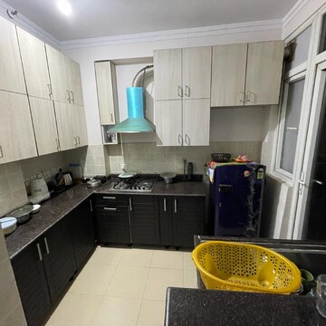 Kitchen in 2 BHK Apartment at Amrapali Platinum, Sector 119 – for Rent
