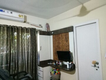 Living Room in 2 BHK Apartment at Woodland Avenue, Kothrud – for Sale