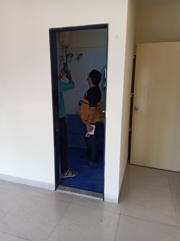 Building Lobby in 2 BHK Apartment at Nirlac Solitaire Tower, Manpada – for Rent
