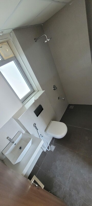 Bathroom in 2 BHK Apartment at Piramal Vaikunth, Balkum Pada – for Rent