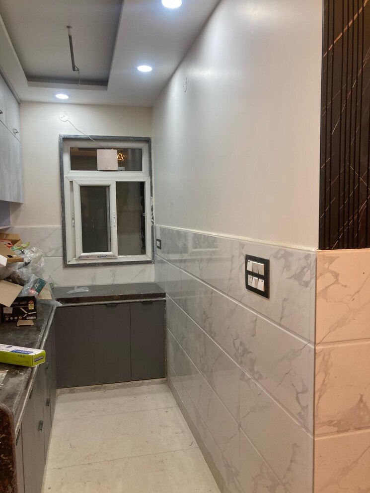 Kitchen, burari 3 Bedroom 100 Sq.Ft. Builder Floor In Burari Delhi 8777584