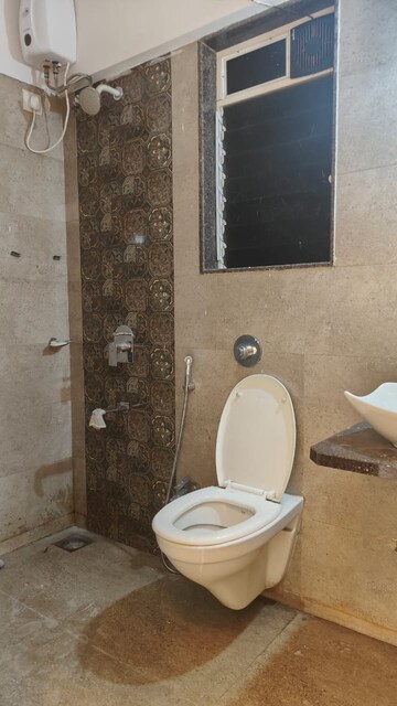 Bathroom in 2 BHK Apartment at Tilak Nagar – for Rent