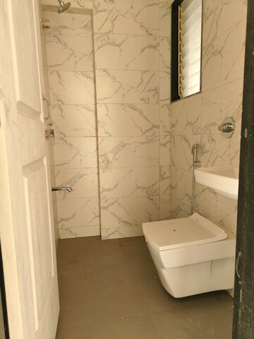 Bathroom in 2 BHK Apartment at Tilak Nagar – for Rent