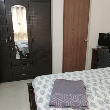 Bedroom in 2 BHK Apartment at Dosti West County, Balkum Pada – for Rent