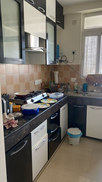 Kitchen in 2 BHK Apartment at Great Value Sharanam, Sector 107 – for Rent