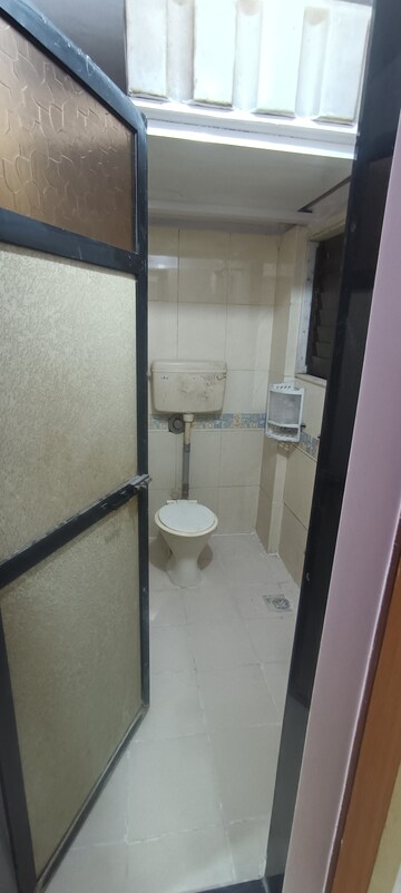 Bathroom in 2.5 BHK Apartment at Dheeraj Heritage Residency, Santacruz West – for Rent