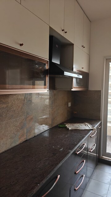 Kitchen in 3 BHK Apartment at Elite Golf Green, Sector 79 – for Rent