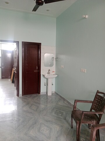 Living Room in 1.5 BHK Builder Floor at Sector 18 – for Rent