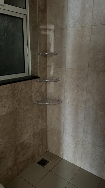 Bathroom in 3 BHK Apartment at Shapoorji Pallonji Joyville Phase 2, Sector 102 – for Rent