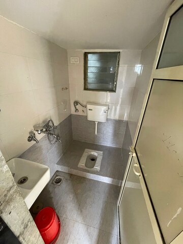 Bathroom in 1 BHK Apartment at Seven Eleven Apna Ghar II, Mira Road – for Rent