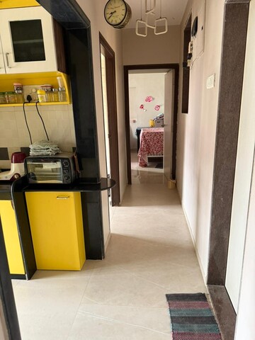 Living Room in 2 BHK Apartment at Pramukh Heights, Andheri West – for Rent