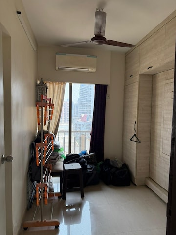 Living Room in 2 BHK Apartment at Pramukh Heights, Andheri West – for Rent