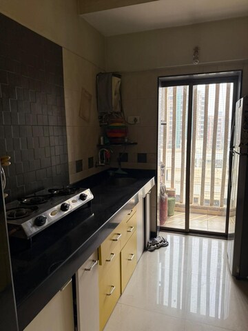 Kitchen in 2 BHK Apartment at Pramukh Heights, Andheri West – for Rent