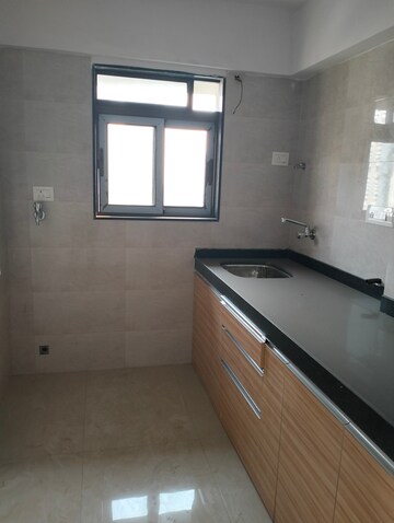 Kitchen in 1 BHK Apartment at Je and Vee Vrindavan, Malad East – for Rent