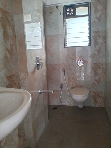 Bathroom in 1 BHK Apartment at Je and Vee Vrindavan, Malad East – for Rent