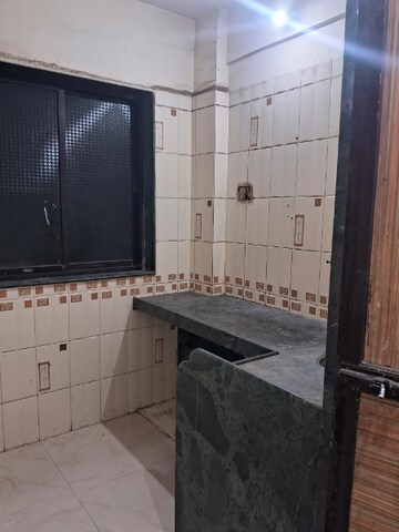 Kitchen in 1 BHK Apartment at Om Chaitanya Niwas, Kopar Khairane – for Rent