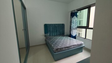 Master Bedroom in 2 BHK Apartment at Kalpataru Immensa, Kolshet Road – for Rent