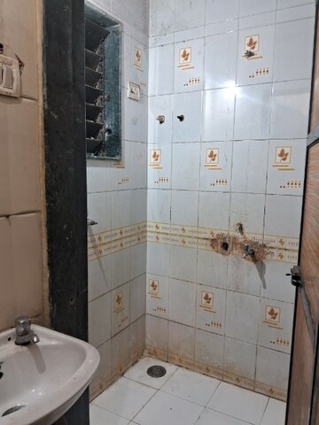 Bathroom in 1 BHK Apartment at Om Chaitanya Niwas, Kopar Khairane – for Rent