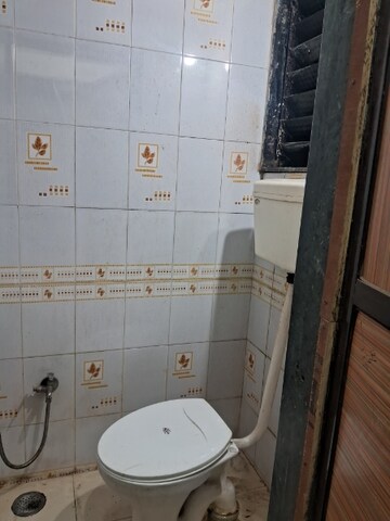 Bathroom in 1 BHK Apartment at Om Chaitanya Niwas, Kopar Khairane – for Rent